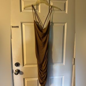 Tan cross back dress. Never worn